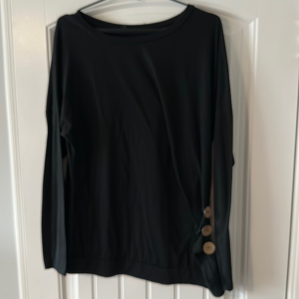Black long-sleeve top with button detail
